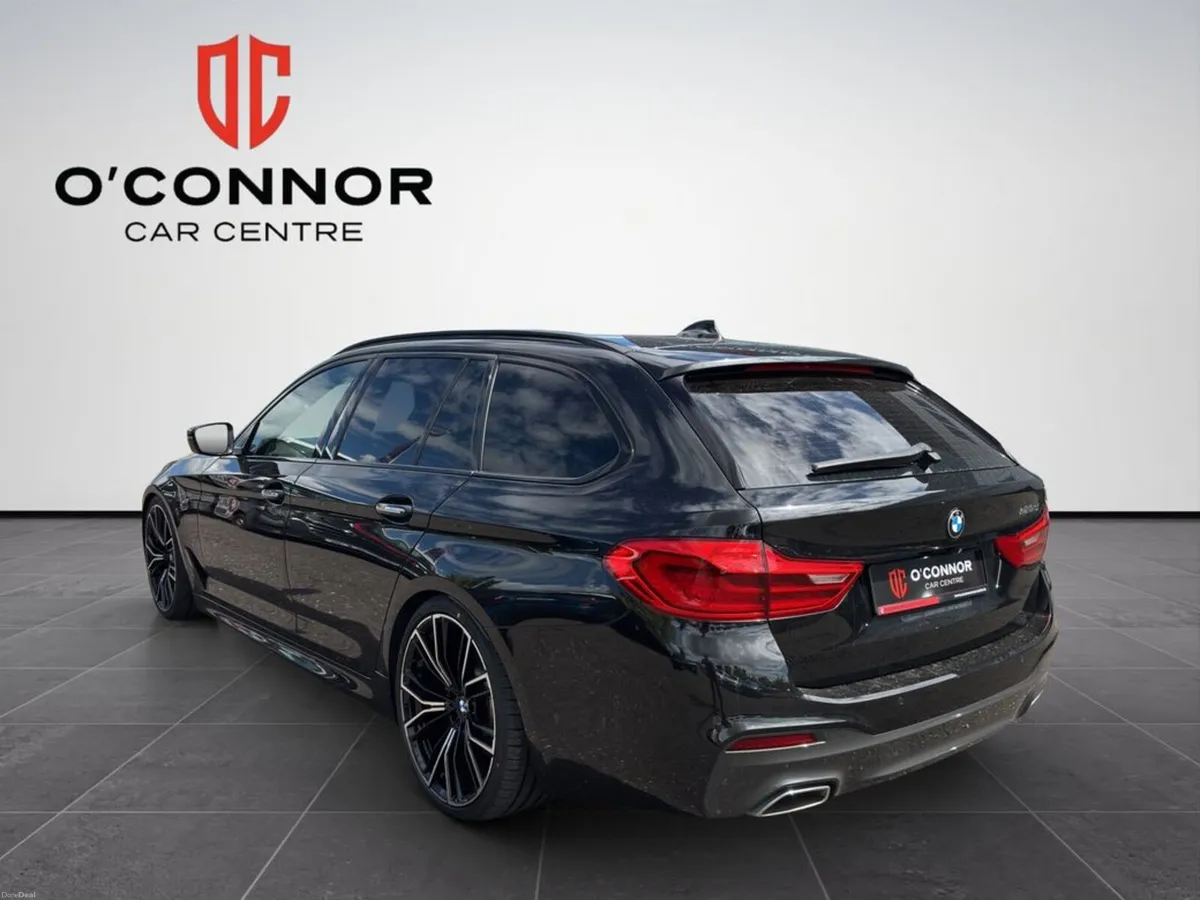 BMW 5-Series Looks like the boss's car. until you - Image 4