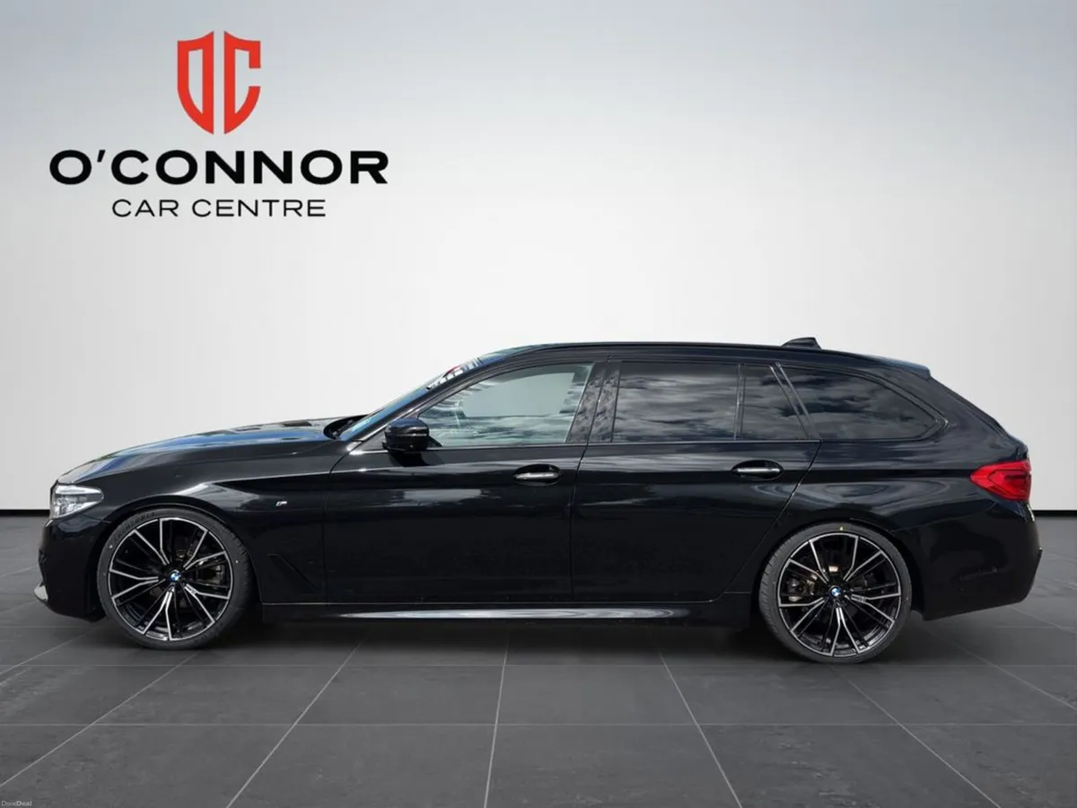 BMW 5-Series Looks like the boss's car. until you - Image 3