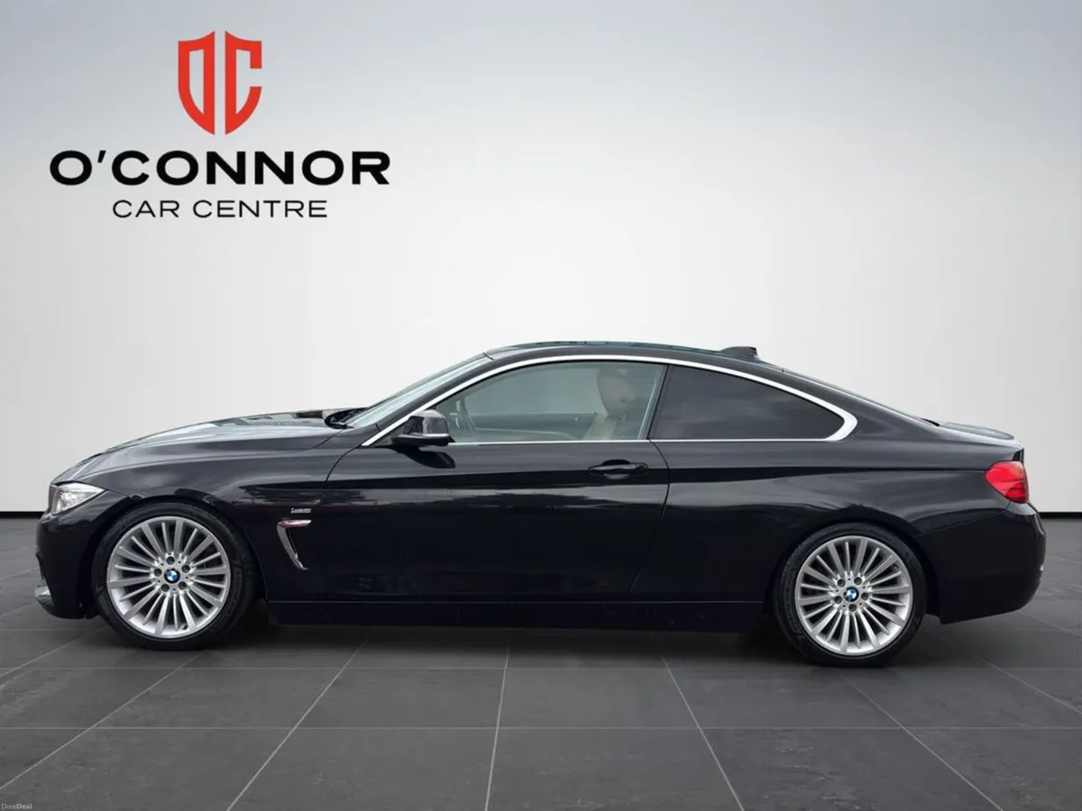 BMW 4-Series Black outside, tan inside. classy fro - Image 3