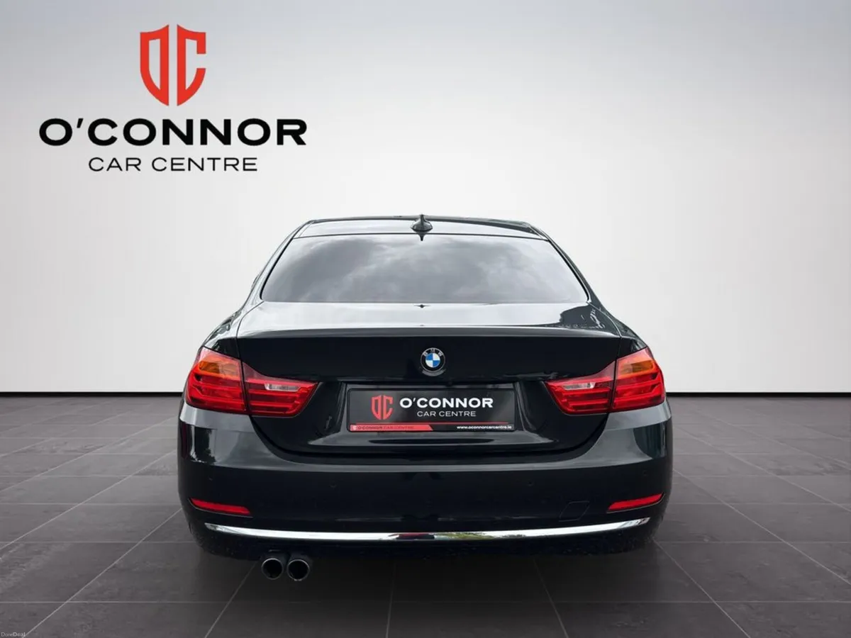 BMW 4-Series Black outside, tan inside. classy fro - Image 5