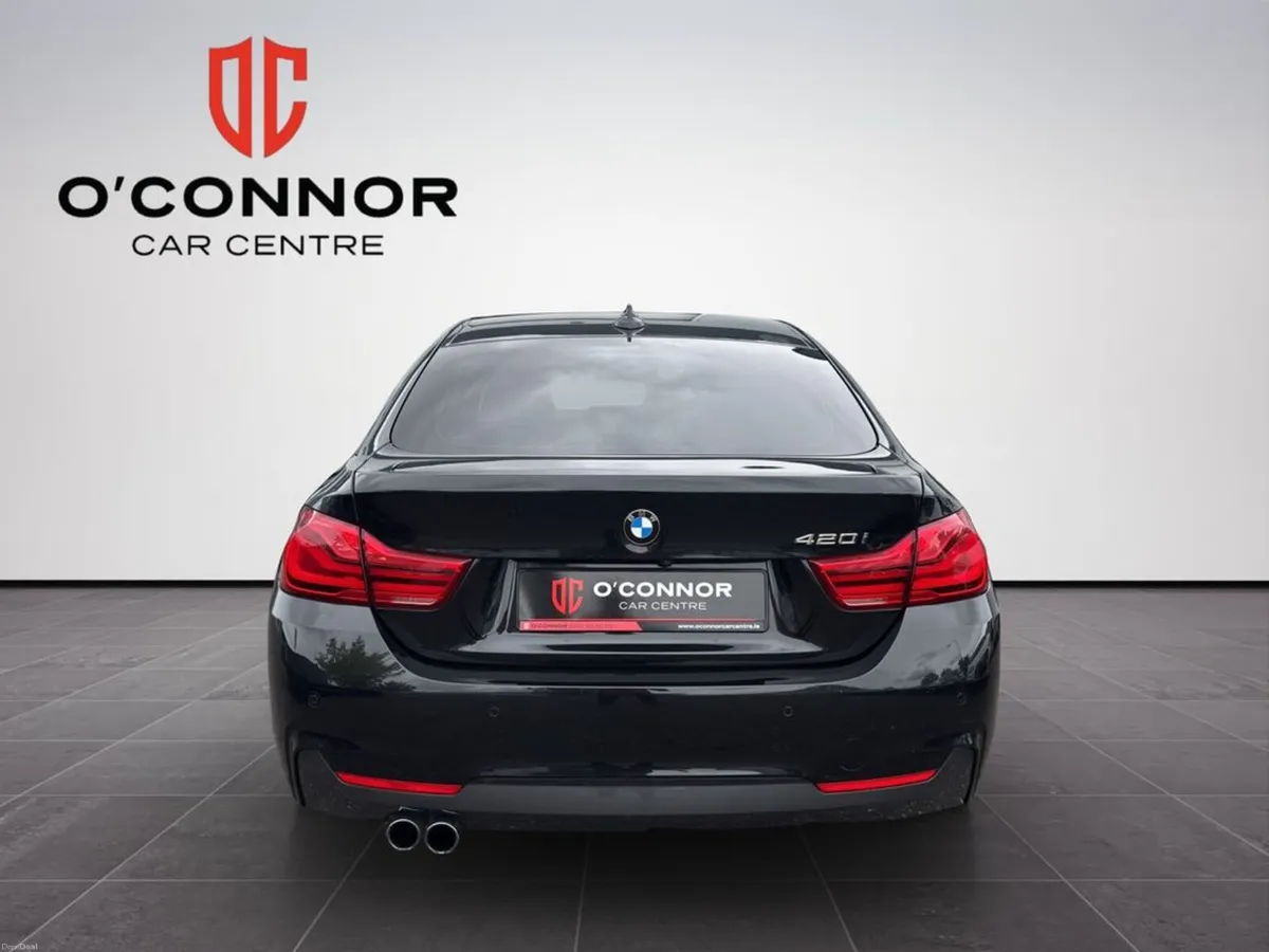 BMW 4-Series All black, all business. until you pu - Image 5