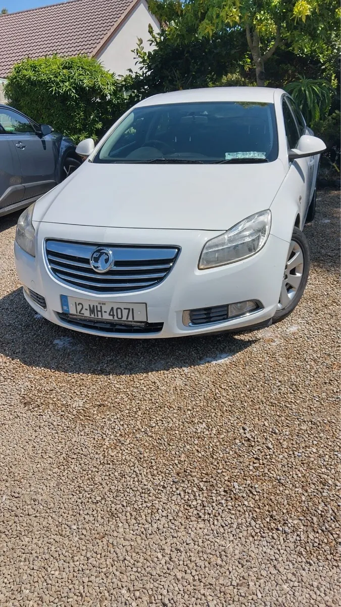 Insignia Sri - Image 1