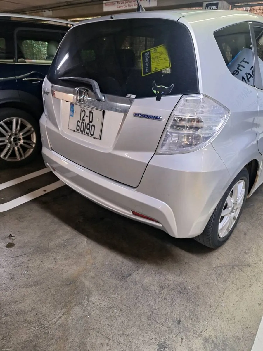 2012 SILVER HONDA FIT HYBRID - Image 1