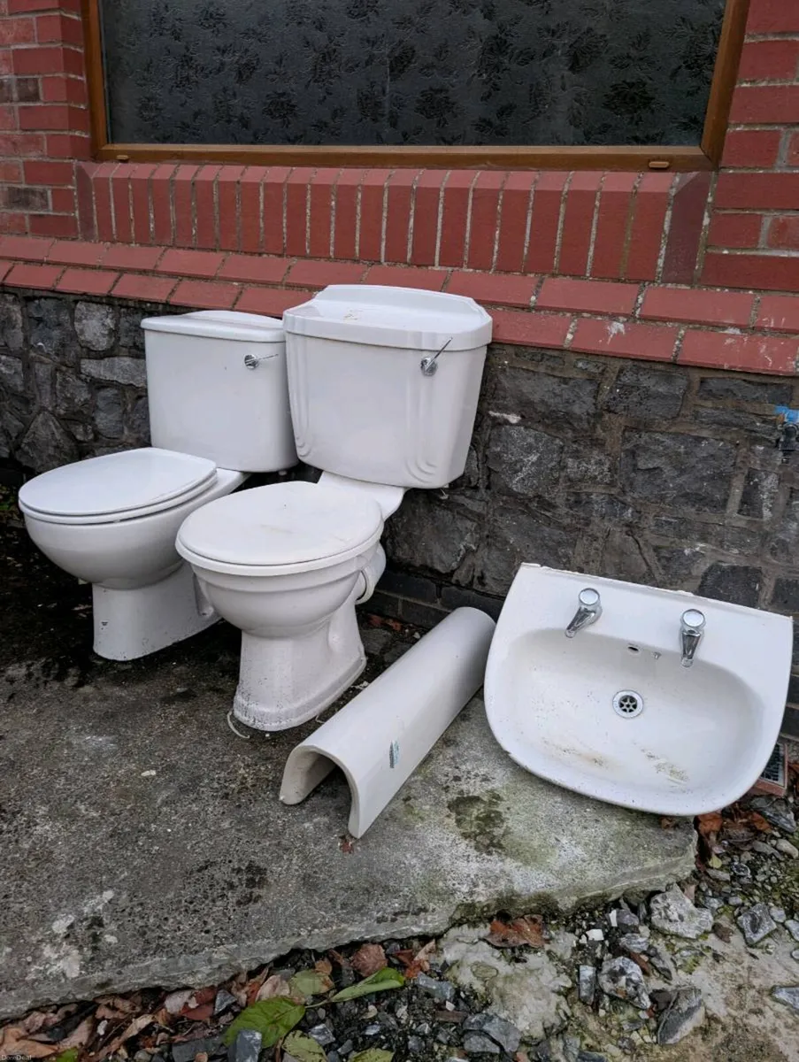 2 toilets and 1 sink in perfect working order