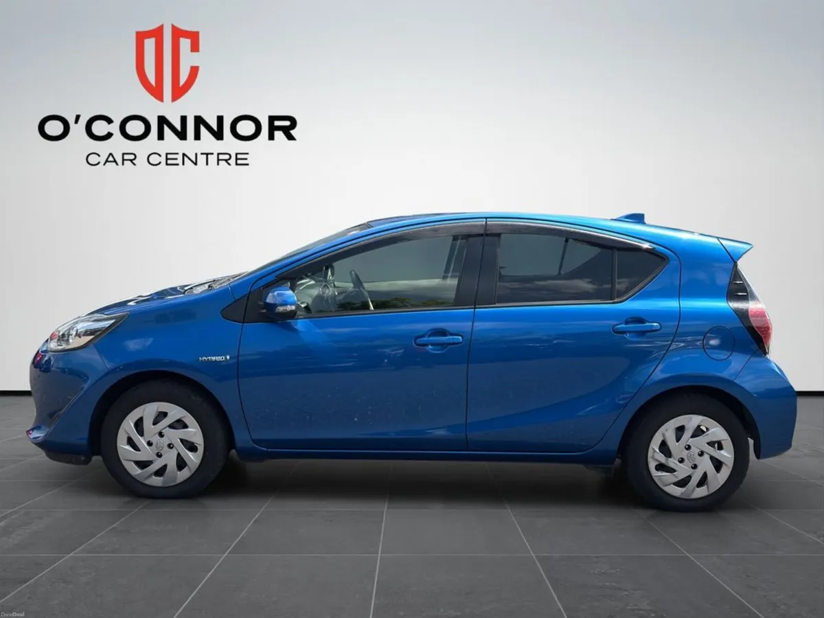 Toyota Aqua Blue on the outside, green at the pump - Image 3
