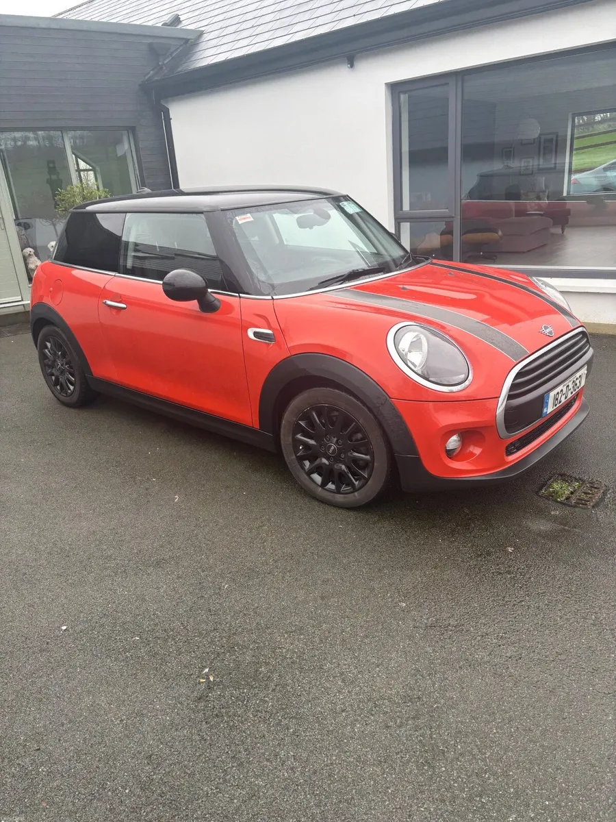 Orange and black Mini Cooper - Image 1