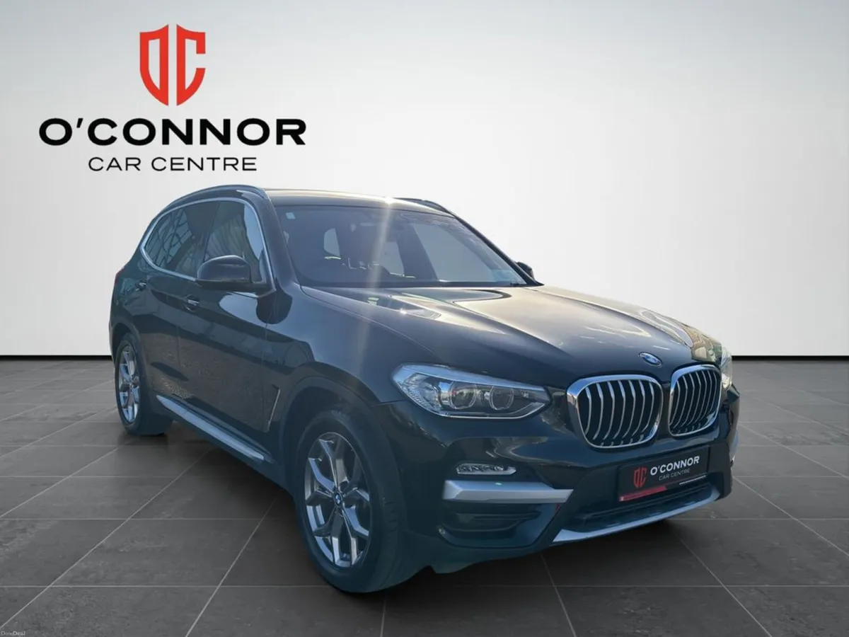 BMW X3 Black on the outside, tan on the inside… th - Image 3