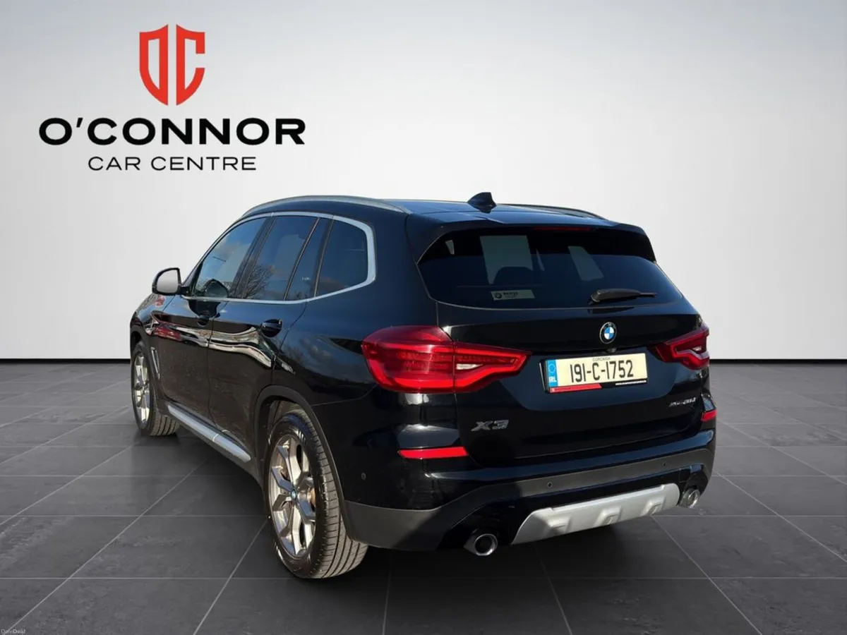 BMW X3 Black on the outside, tan on the inside… th - Image 5