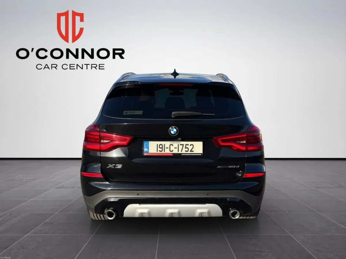 BMW X3 Black on the outside, tan on the inside… th - Image 6