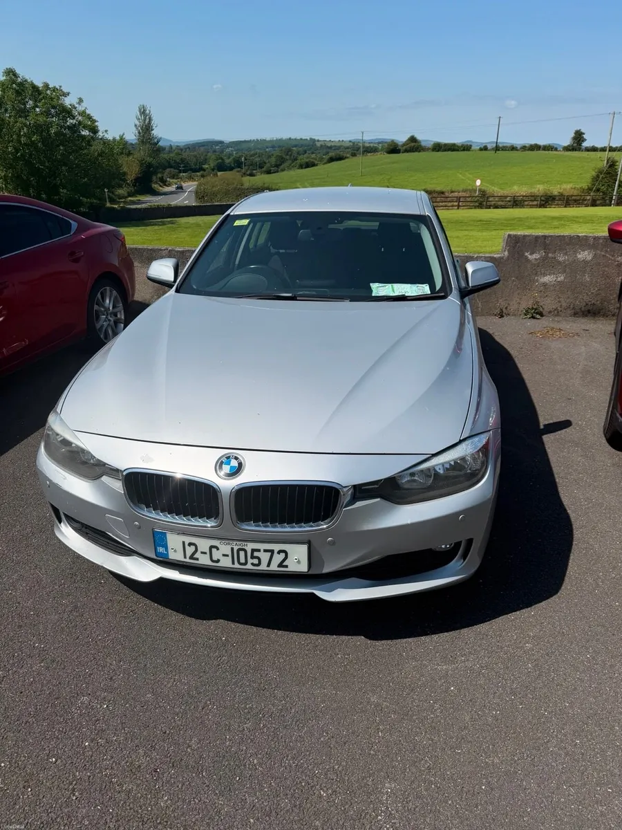2012 BMW 3 Series - Image 1