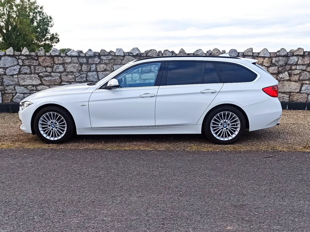 151 BMW 320d Touring Auto • Tan Leather - Image 4