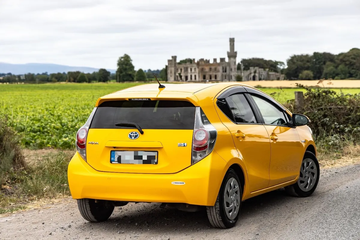 Bright Toyota Aqua 2014, Excellent Condition - Image 3
