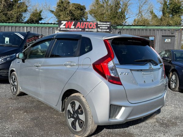 17HONDA FIT HALF LEATHER SEATS 381546574
