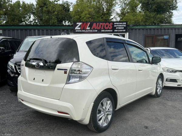 11 HONDA FIT HYBRID 1.3 HEATER SEATS 390398686