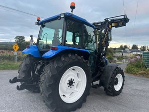 2006 New Holland TL100A with RossMore Loader - Image 3