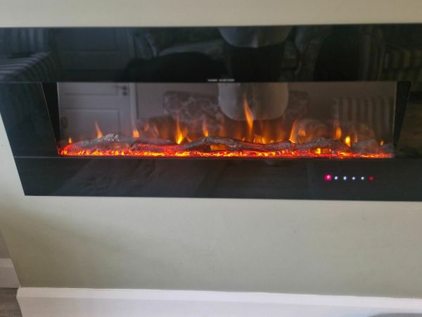 Wall mounted black electric fire for sale in Co. Meath for €320 on DoneDeal