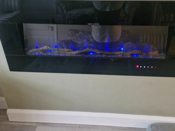 Wall mounted black electric fire for sale in Co. Meath for €320 on DoneDeal