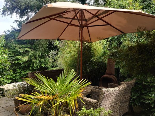 large patio umbrellas ireland KOTO Parasol Ø200 Ø250cm 300x200 400x300 you can open and shut it with a simple twist of a crank garden umbrella | 24 All