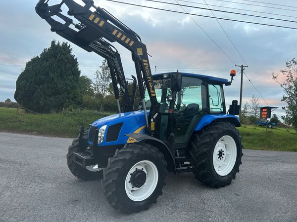 2006 New Holland TL100A with RossMore Loader - Main image