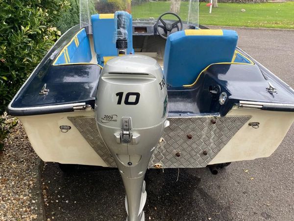 Boat & Honda Outboard Motor - Main image