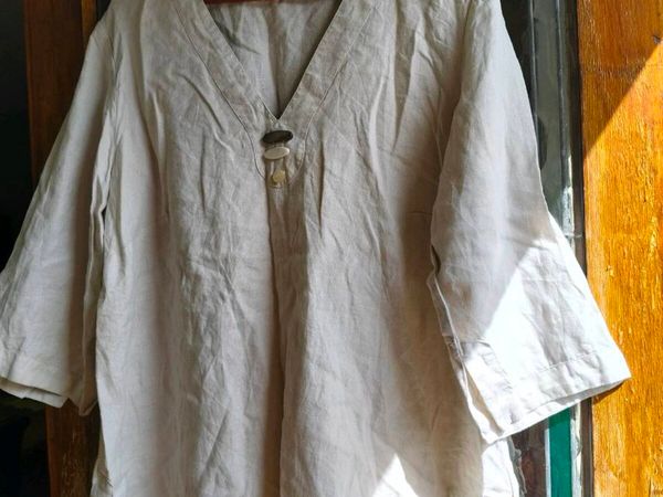 light beige linen tunic top featuring a V-neckline - Main image