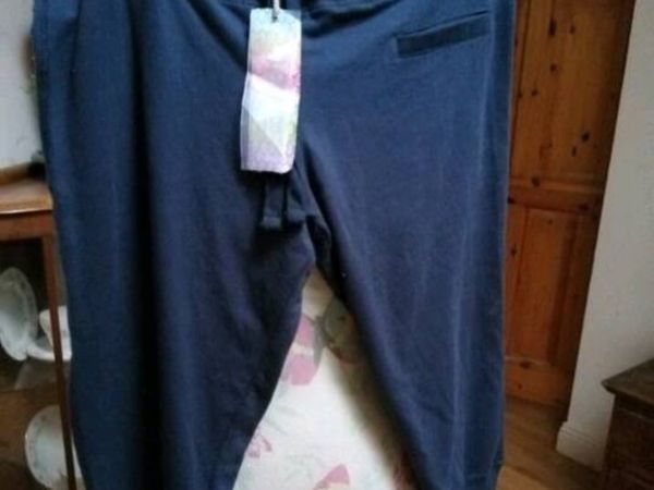 Navy. Penny's Capri tracksuit material pants draw - Main image