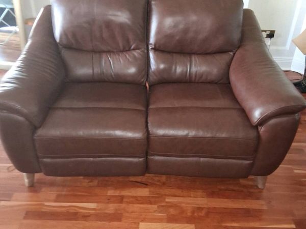 Two 2 seater leather sofas electric recliners as n - Main image