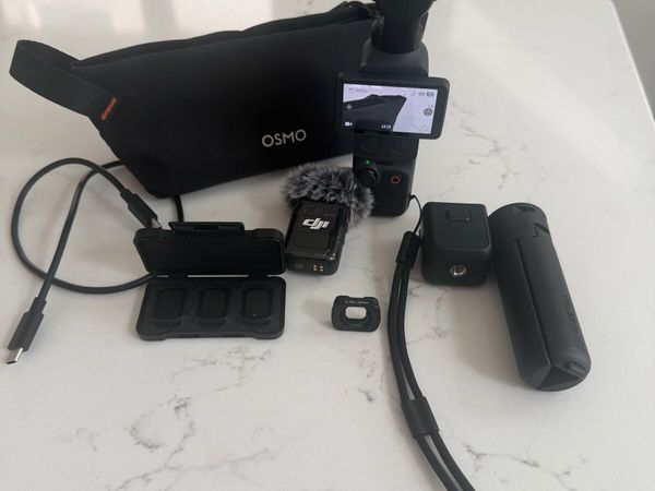 DJI Osmo Pocket 4 + Accessories - Main image
