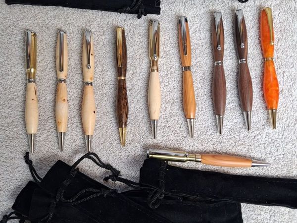 Woodturned pens and lamps . - Main image