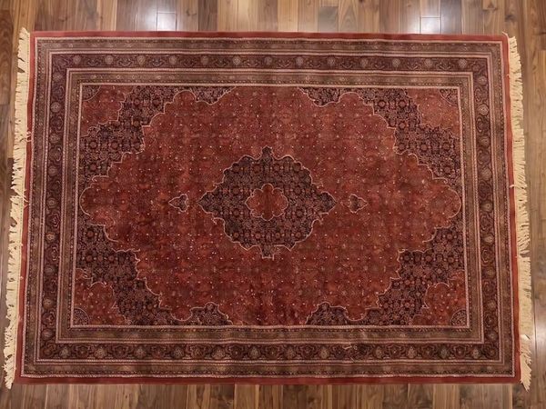 This is a good old hand knotted carpet - Main image