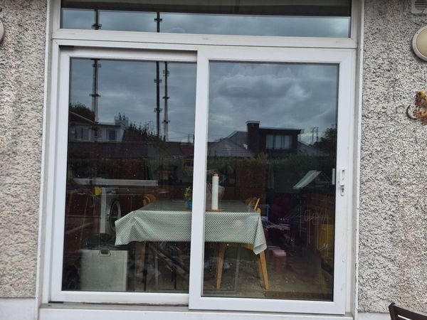 Fairco sliding door and transom window - Main image