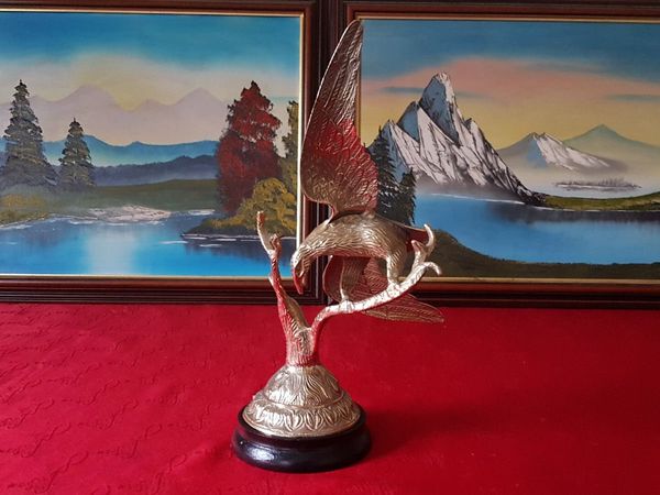 Solid Brass Eagle On A Round Black Plinth Base - Main image