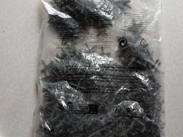 BAG OF TILE SPACERS (NEW). - Main image
