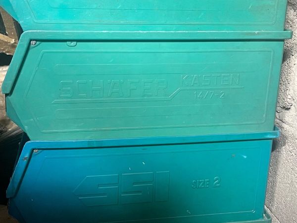 Seven green hard plastic boxes - Main image