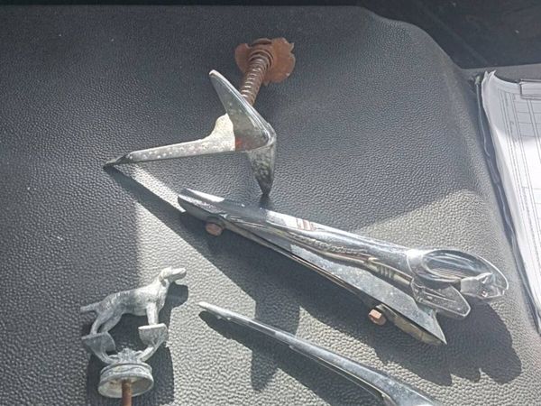 Four old car badges - Main image