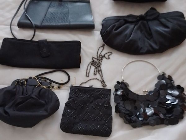 COLLECTION OF 8 VINTAGE BLACK CLUTCH BAGS. - Main image