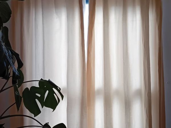 Cream curtains with wooden rail - Main image