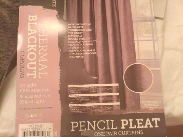 Lovely new set black out curtains still in pkt. - Main image
