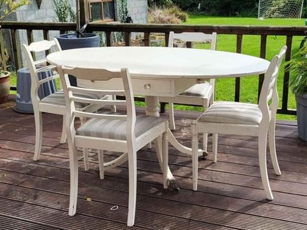 Antique Oval drop leaf table with claw legs and four chairs - Main image