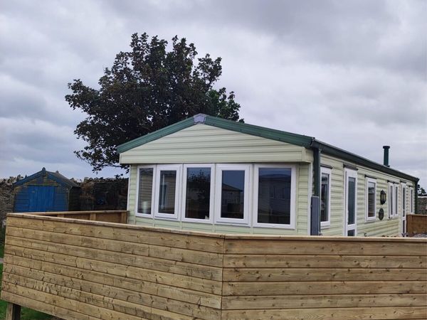 Mobile home and decking - Main image
