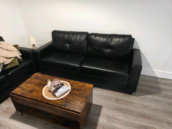Black puffer couch - Main image