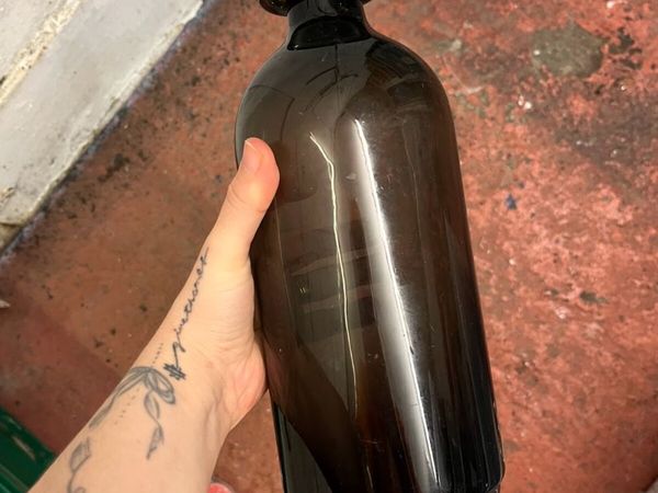 Approx. 40 Clear, Black, Brown, Amber & Gold Vases - Main image
