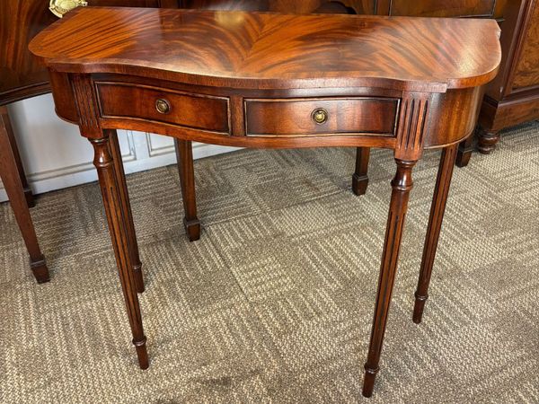 Fabulous mahogany flamed bow ended console table. - Main image
