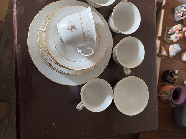 Six piece set of finebone  China, six cups, six saucers, six side plates, one larger plate and sugar bowl. - Main image