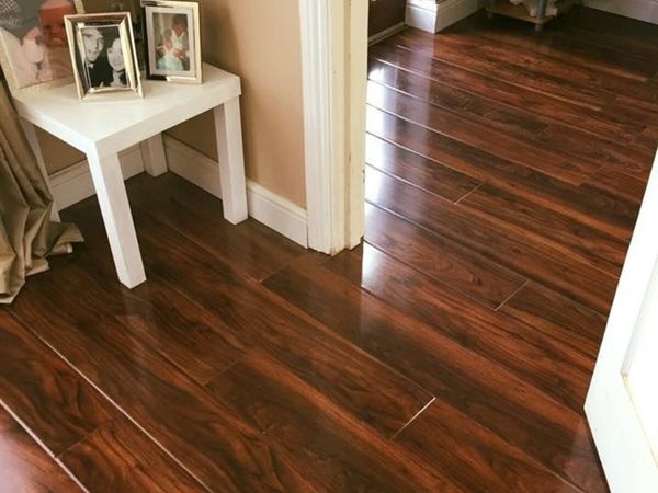 12mm Calgary Walnut Gloss Flooring - Main image