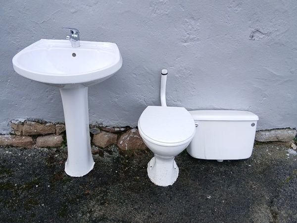 Bathroom Sink and Toilet - Main image