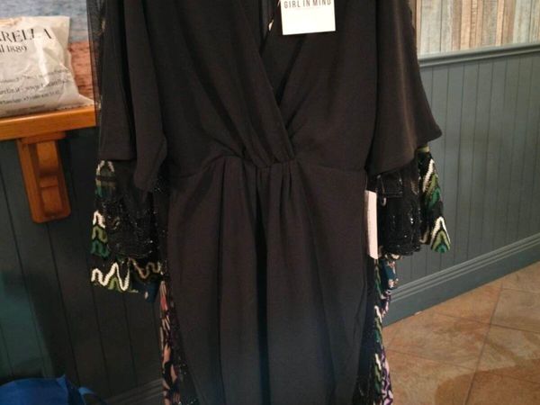 Black dress from Girl in Mind. V neck wrap front d - Main image