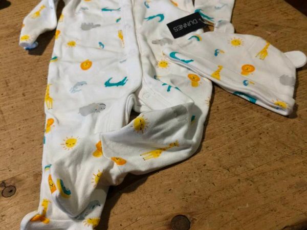 Dunnes Stores baby sleepsuit features an all-over - Main image