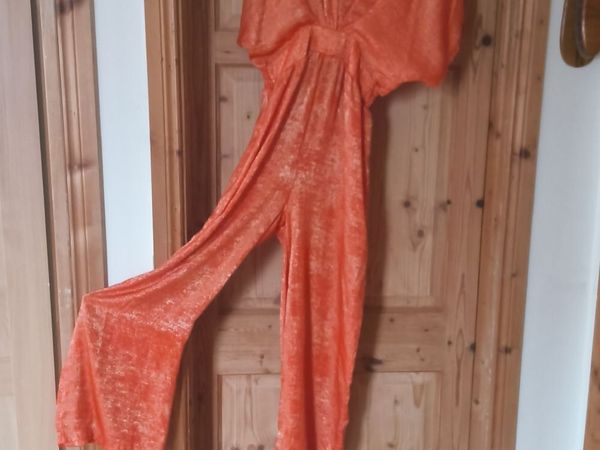Orange coloured jump suite as new - Main image