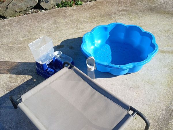 Dog raised bed and paddling pool - Main image
